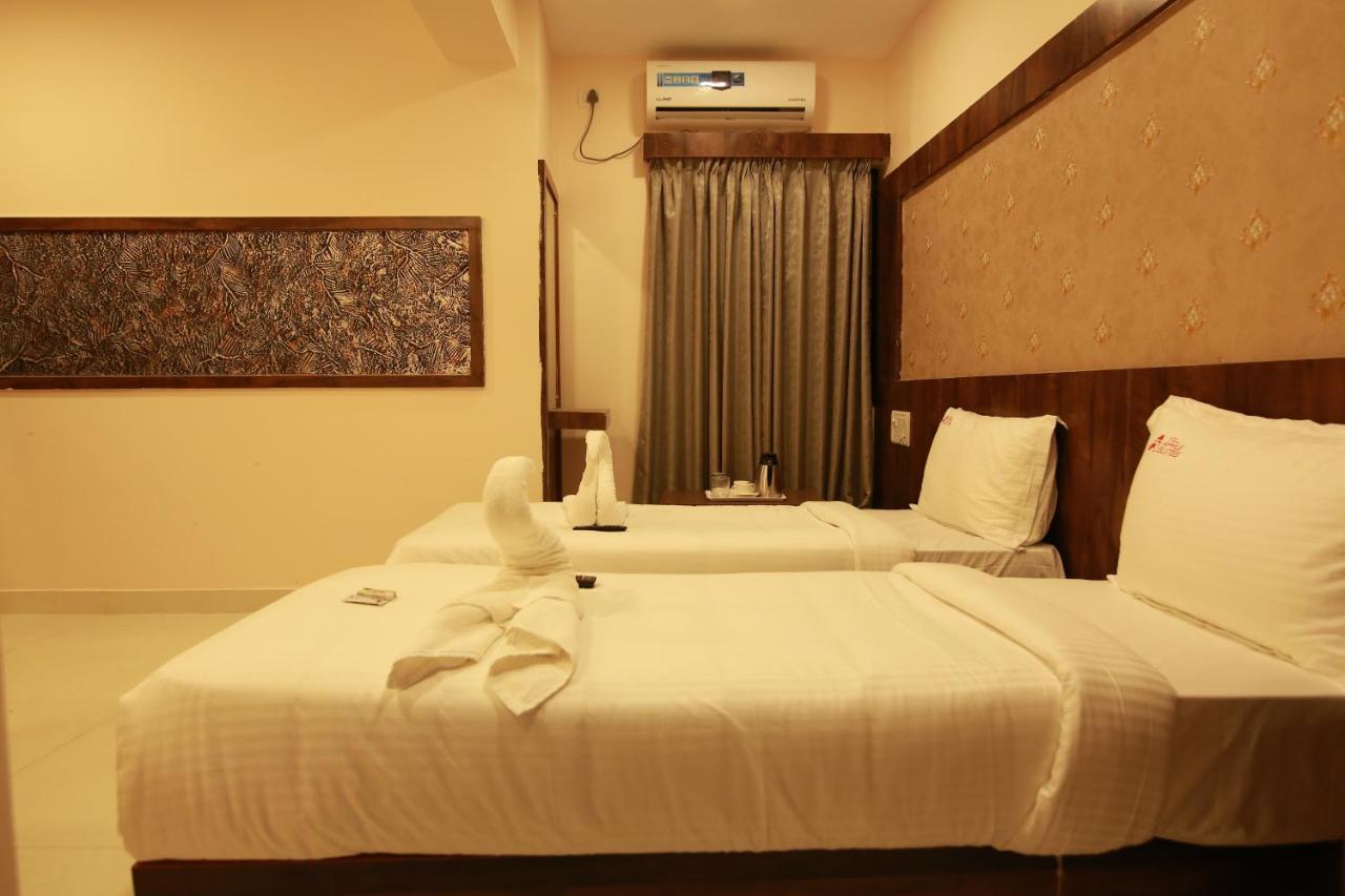 Hotel Apple Suites Bangalore Exteriör bild