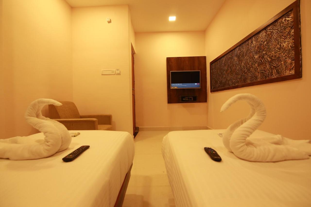 Hotel Apple Suites Bangalore Exteriör bild