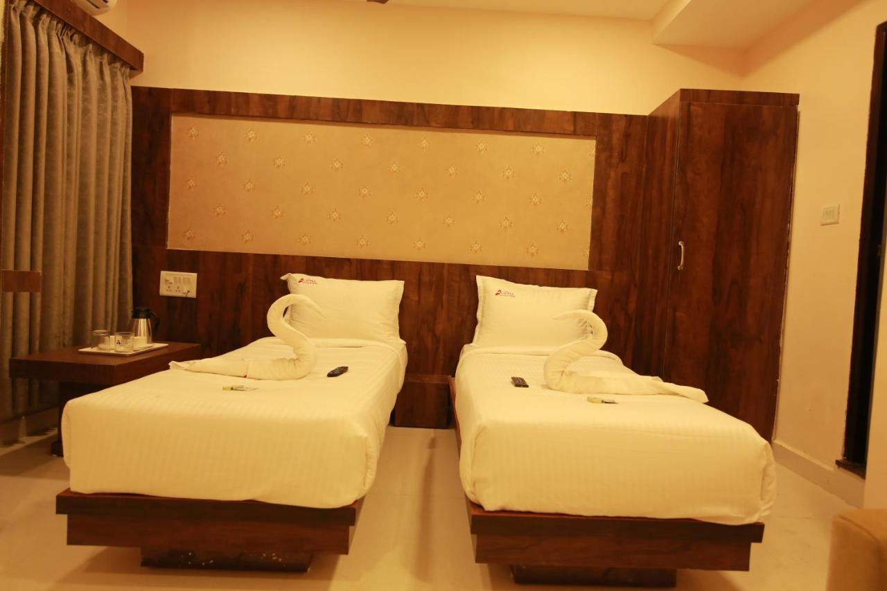 Hotel Apple Suites Bangalore Exteriör bild