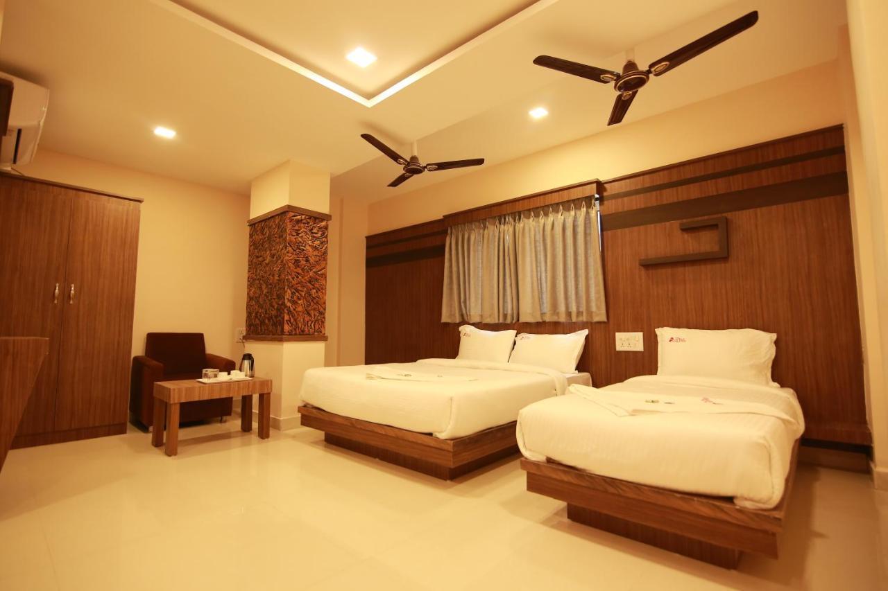 Hotel Apple Suites Bangalore Exteriör bild
