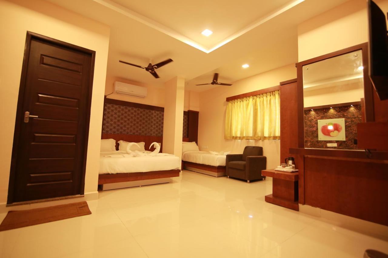 Hotel Apple Suites Bangalore Exteriör bild